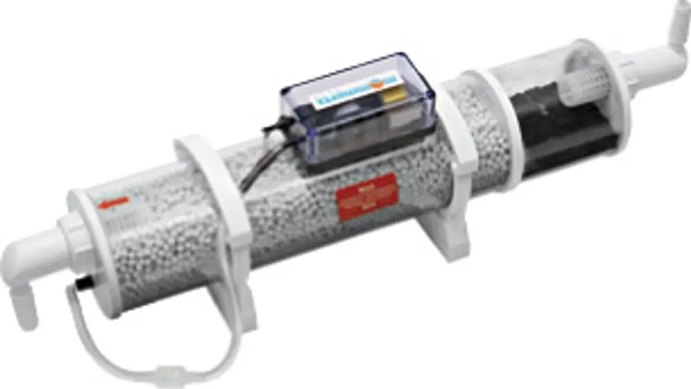 Bosch Neutralisationssystem mit transparenten Gehäusen, durch die Granulate sichtbar sind. Verbindungsschläuche und elektrische Komponenten sind ebenfalls abgebildet.